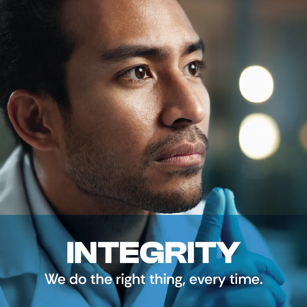 Integrity. We do the right thing, every time. A photo of a middle-aged male scientist conveying trustworthiness.
