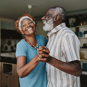 Couple dancing and smiling