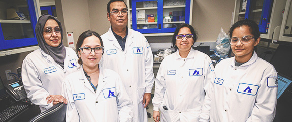 Apotex employees standing in office setting